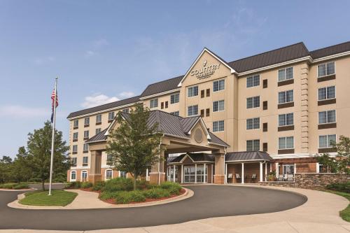 Country Inn & Suites by Radisson, Grand Rapids East, MI allows 18 year olds to book a room in Grand Rapids