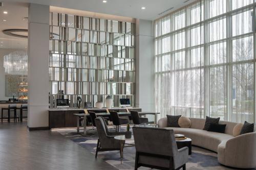 AC Hotel by Marriott Charlotte Ballantyne allows 18 year olds to book a room in Charlotte