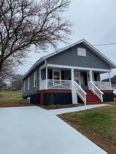 High ceiling home by downtown allows 18 year olds to book a room in Winston-Salem