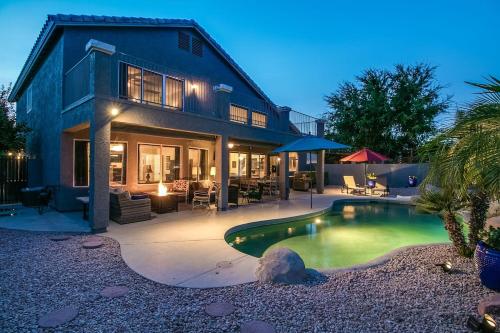 Spectacular Golf Course Home with Pool and Views allows 18 year olds to book a room in Gilbert