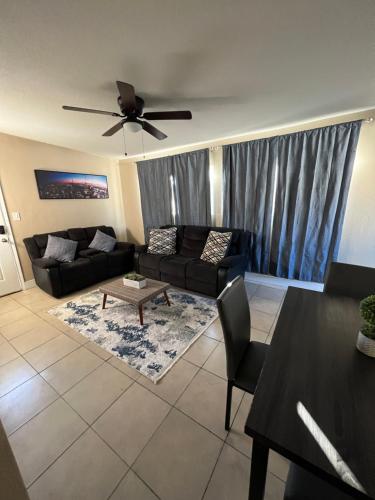 Central 3 Bedroom Flat W/ Private Yard allows 18 year olds to book a room in North Las Vegas