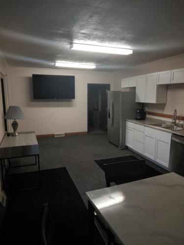 E Michigan Walk Up Furnished APTS - 1 and 2 Bedroom allows 18 year olds to book a room in Lansing